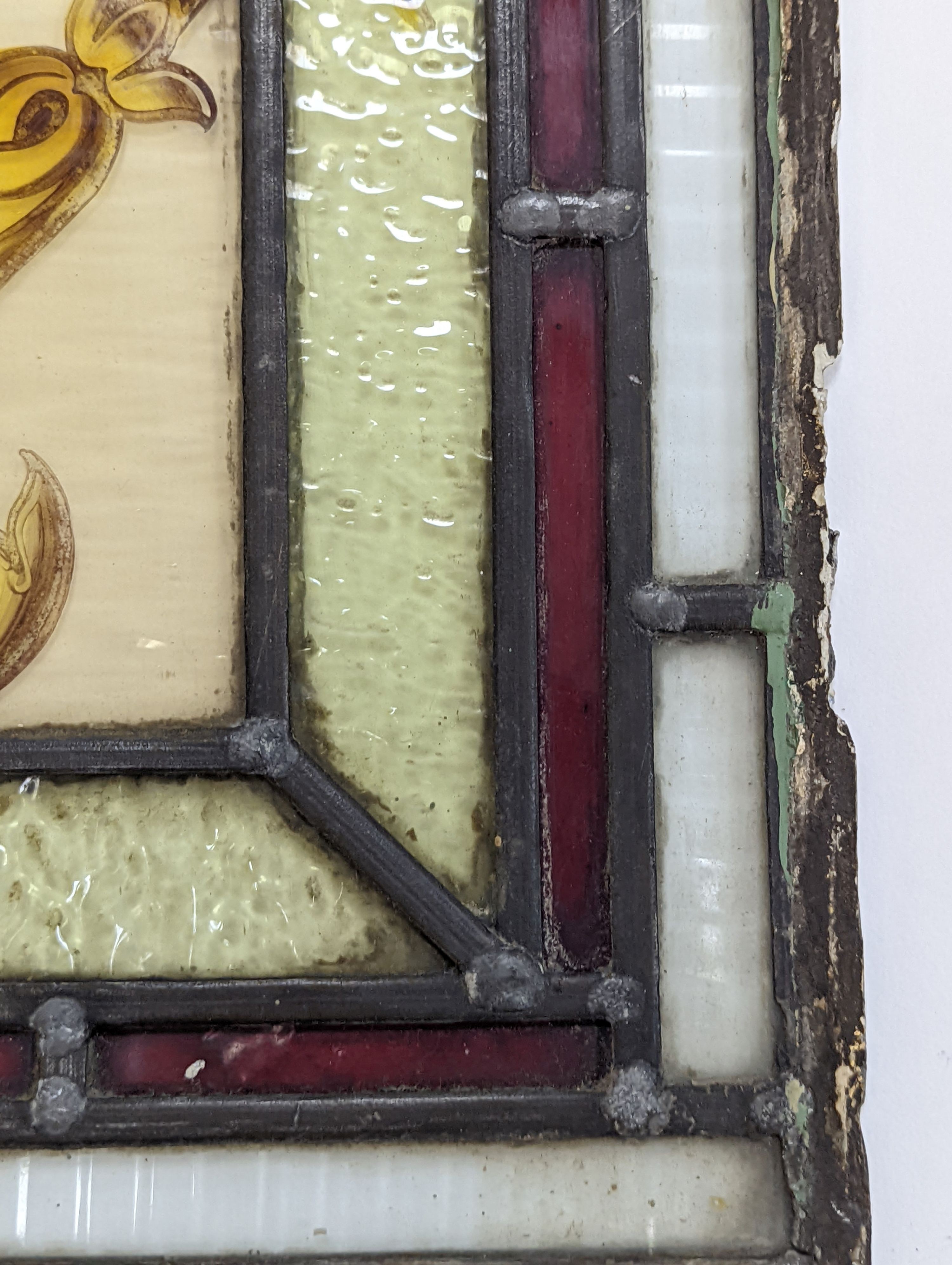 Two 19th century stained glass panels, largest 68x28cm